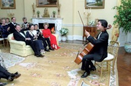 10/6/1987 President Reagan Nancy Reagan Crown Prince Akihito and Crown Princess Michiko listen to Yo-Yo Ma perform in the Yellow Oval Room during a private dinner for Crown Prince Akihito of Japan